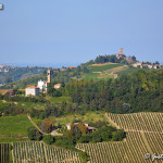 La parrocchiale di Castagnara e sullo sfondo il castello di Cigognola